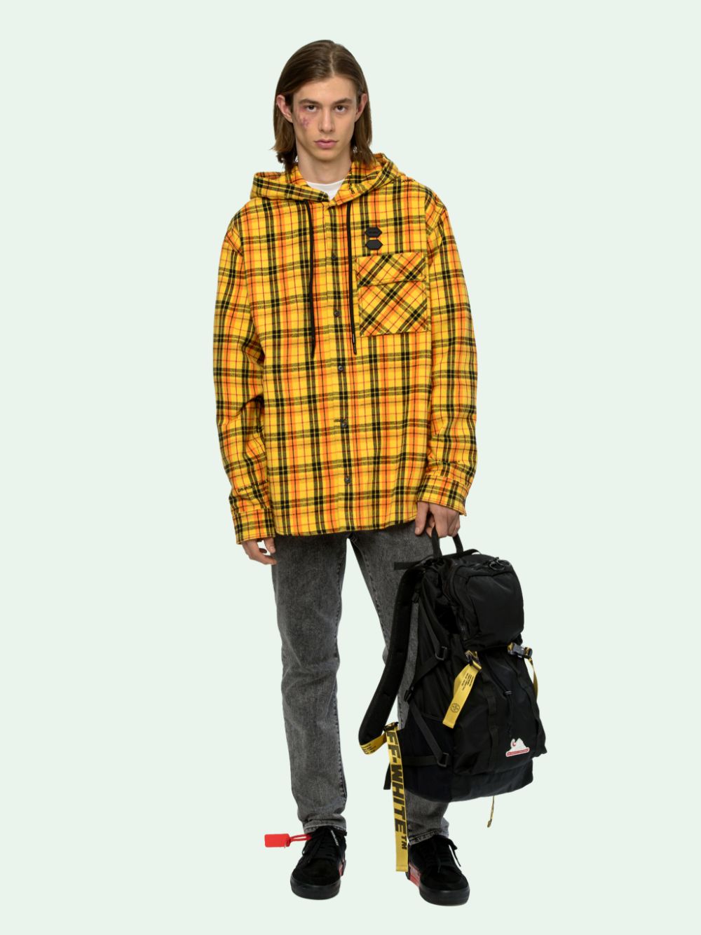 yellow hooded shirt