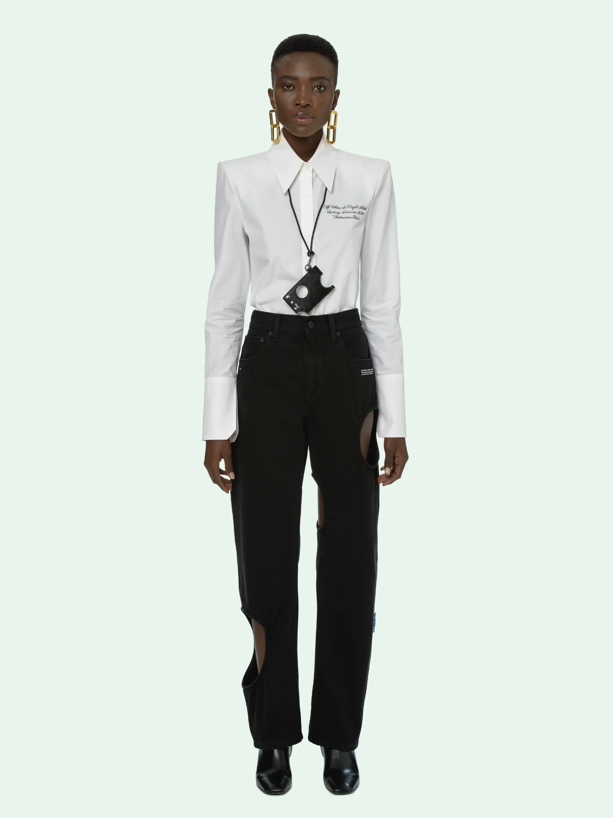 white pants with holes