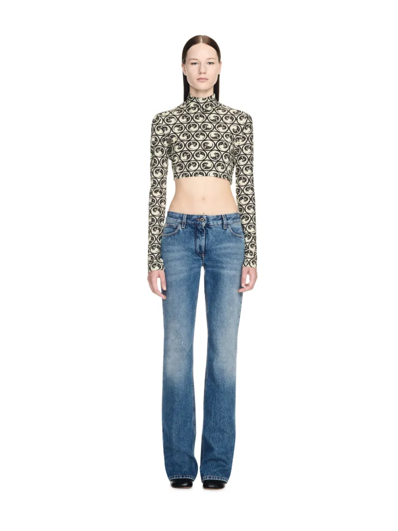 Top cropped aderente con motivo luna