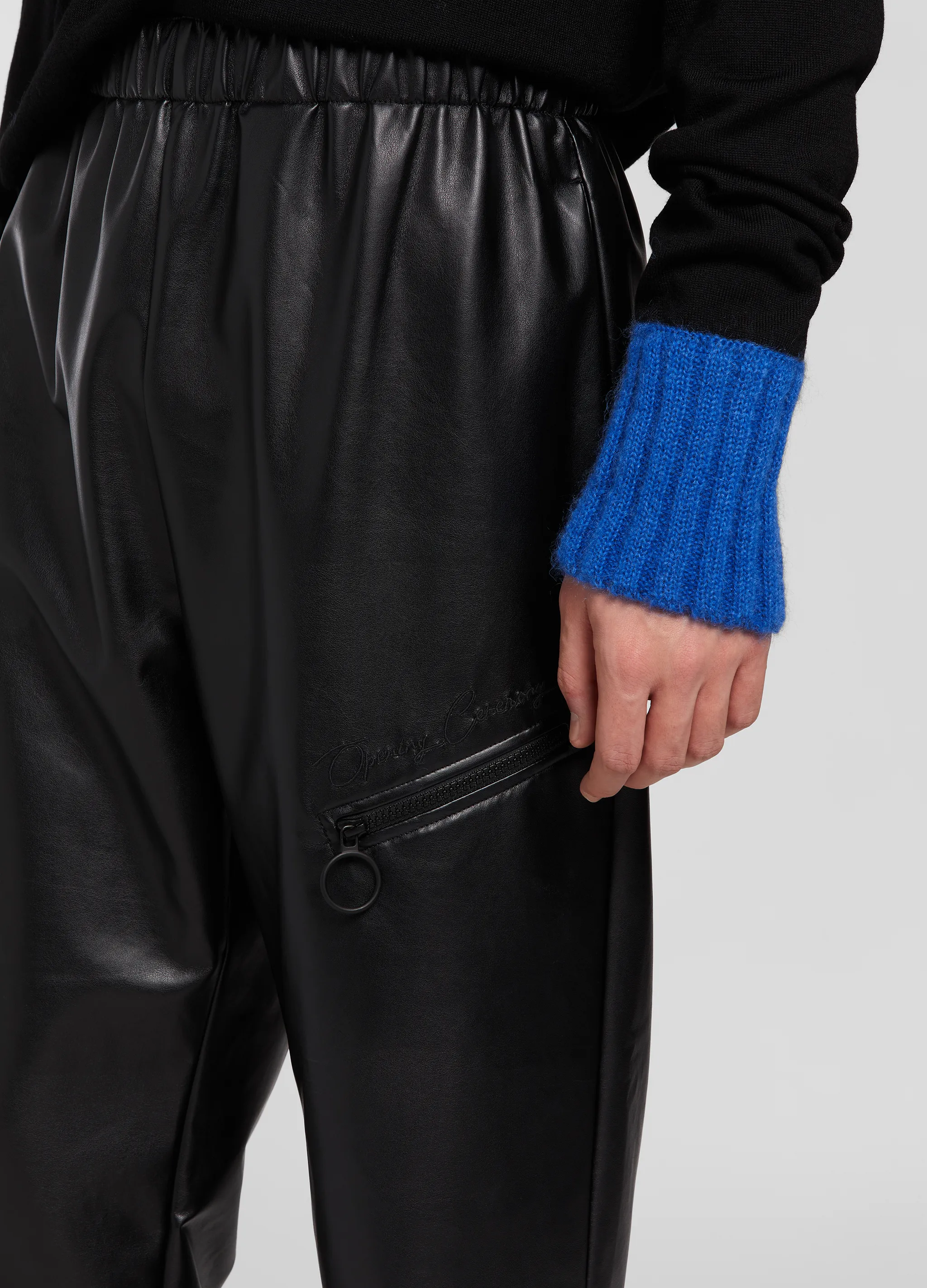 FAUX LEATHER TRACKPANTS