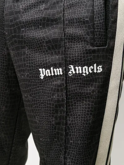 crocodile track pants