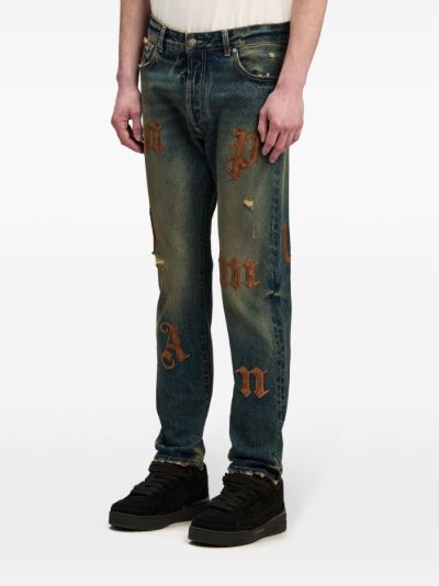 Palm Angels logo-patch loose jeans | Eraldo.com US