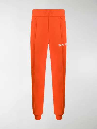 Palm Angels Pantaloni sportivi con applicazione arancione | MODES