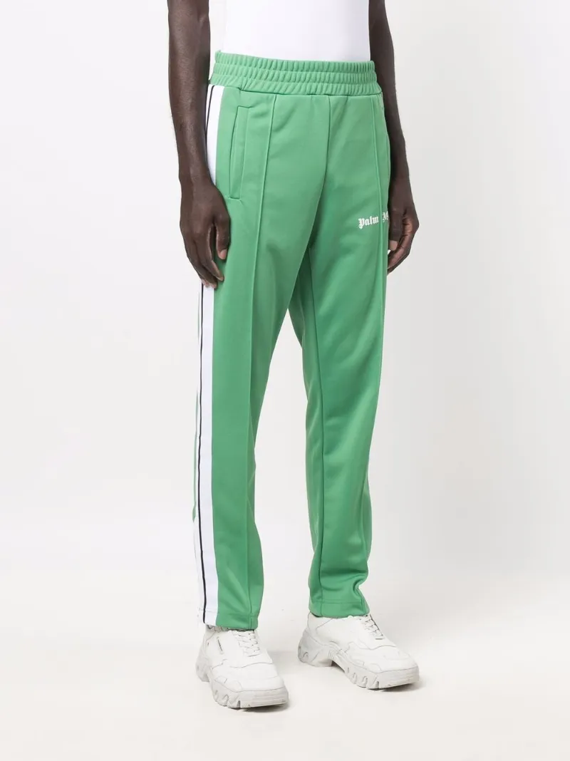 Palm Angels Pantaloni sportivi con banda laterale verde | MODES