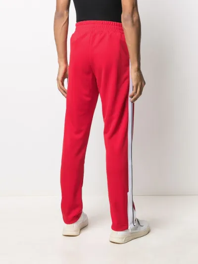 Palm Angels Pantaloni sportivi con logo rosso | MODES