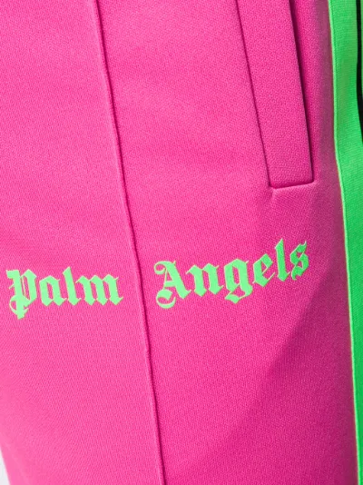 Palm Angels Pantaloni sportivi con righe laterali rosa | MODES
