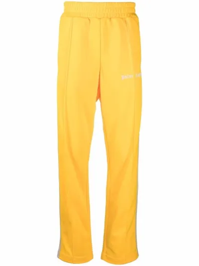 yellow track pants