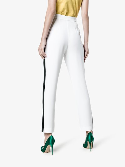 white trousers black stripe