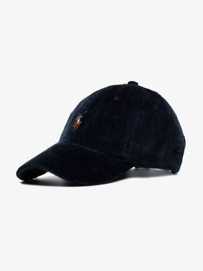 white and navy blue polo hat
