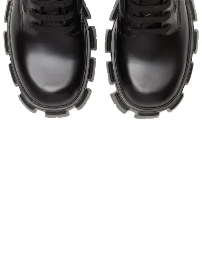 prada ankle pouch combat boots