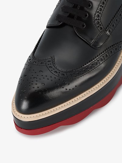 black brogues with brown soles
