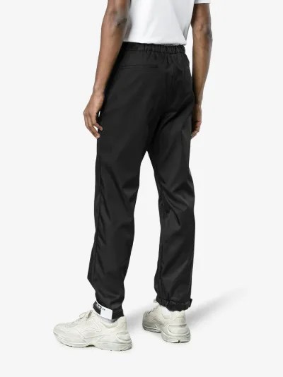 prada rubber tag track pants