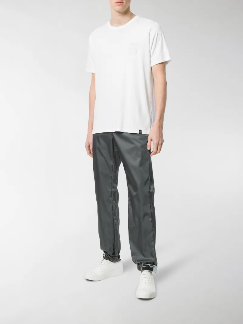 prada rubber tag track pants