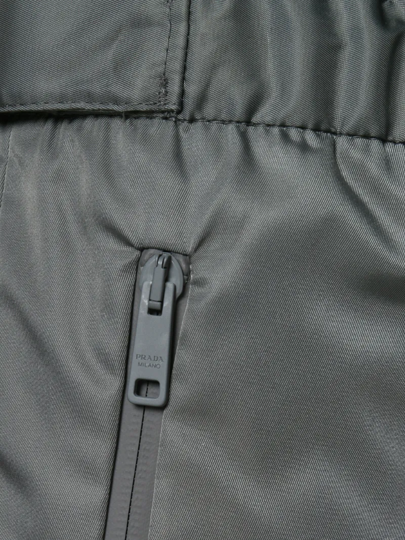 prada rubber tag track pants
