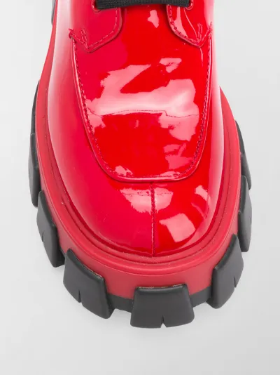 Prada Stivali con tasche laterali rosso | MODES