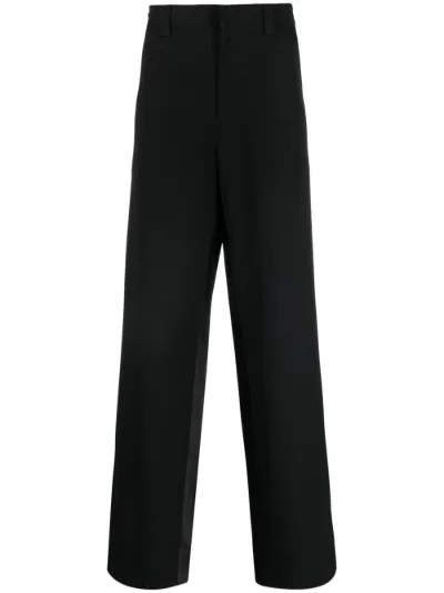 Prada triangle-logo wool trousers | Eraldo.com US
