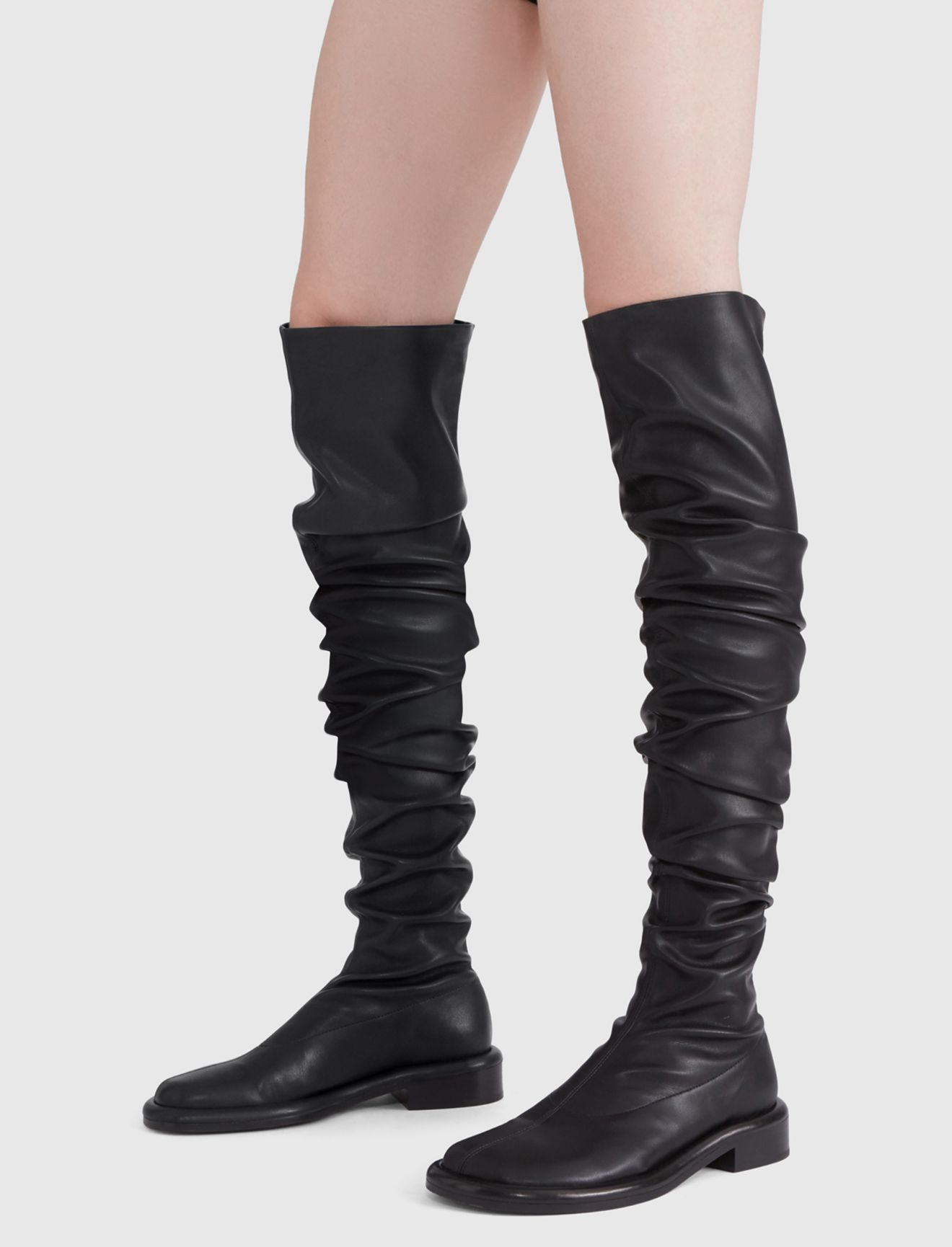 over the knee stretch boots