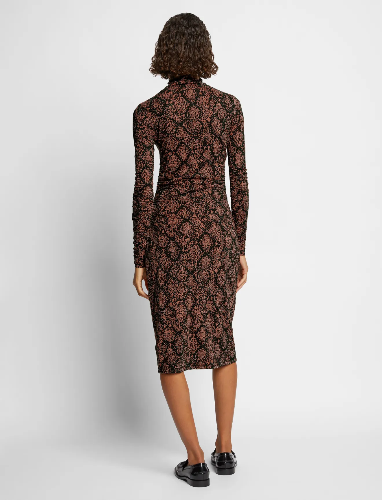 snake print turtleneck dress