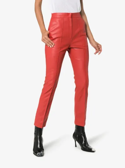 red faux leather trousers