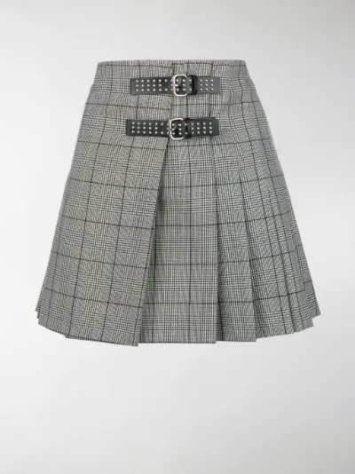 red and black pleated mini skirt