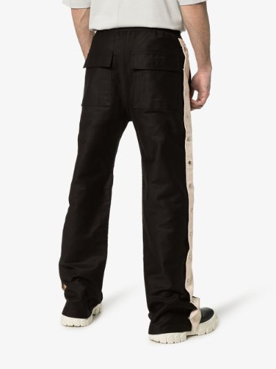 track pants with side buttons