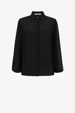 Blusa de seda con cordones