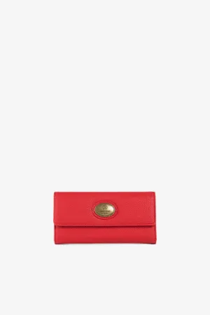 bolso de mano con placa del logo