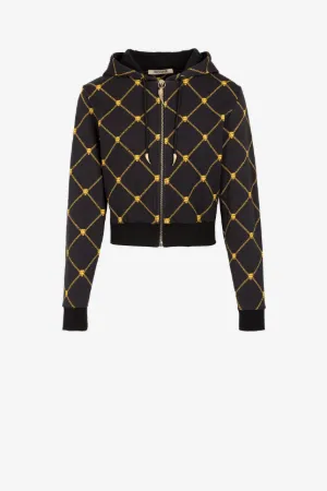 Chaqueta con capucha, cadenas y cabezas de pantera