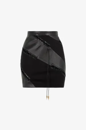 Falda con paneles y cordones