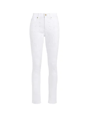 Jean skinny à broderie anglaise