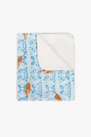 couverture à motif monogrammé