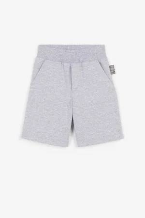 Pantalón corto con águila