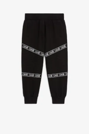 Pantalon de survêtement à rayures à logos
