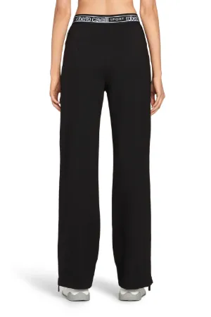 pantalones con detalles de cremallera