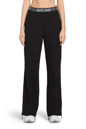 pantalones con detalles de cremallera