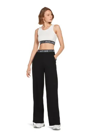 pantalones con detalles de cremallera
