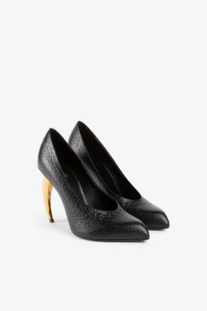Pumps mit Tigerzähnen