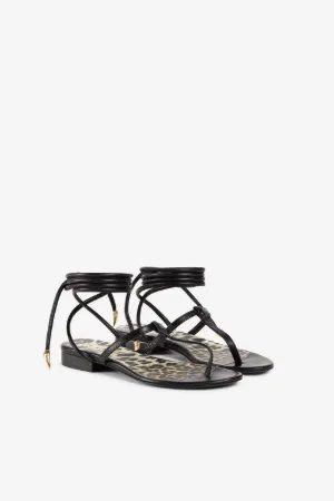 Sandali infradito in pelle con zanne
