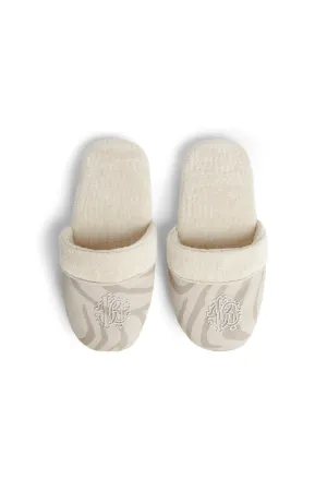 Slipper mit Zebra-Print und Logo