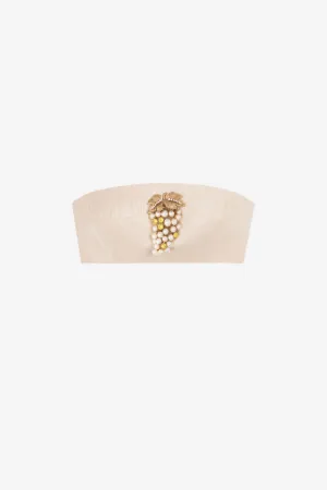 Top bandeau de muaré con adorno de uva