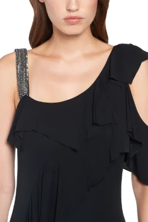 Vestido de fiesta con volantes y apliques