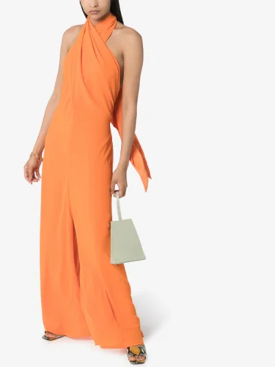orange halter neck jumpsuit