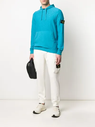 turquoise stone island hoodie