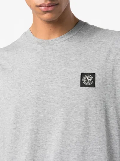 Stone island t shirt with patch on sale