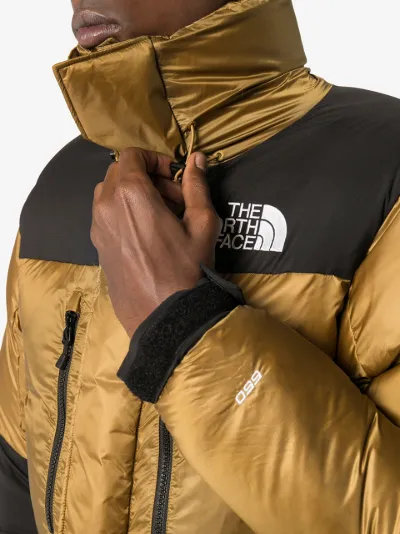 brown and black north face jacket