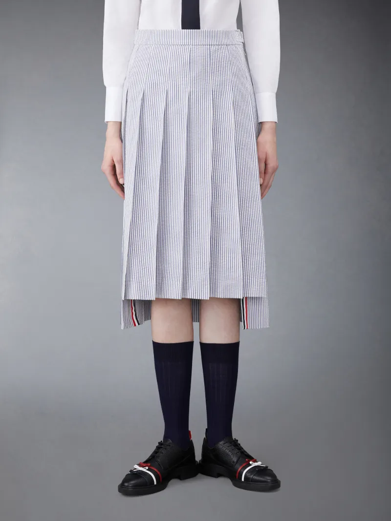 BELOW KNEE DROPPED BACK PLEATED SKIRT IN SEERSUCKER Thom Browne