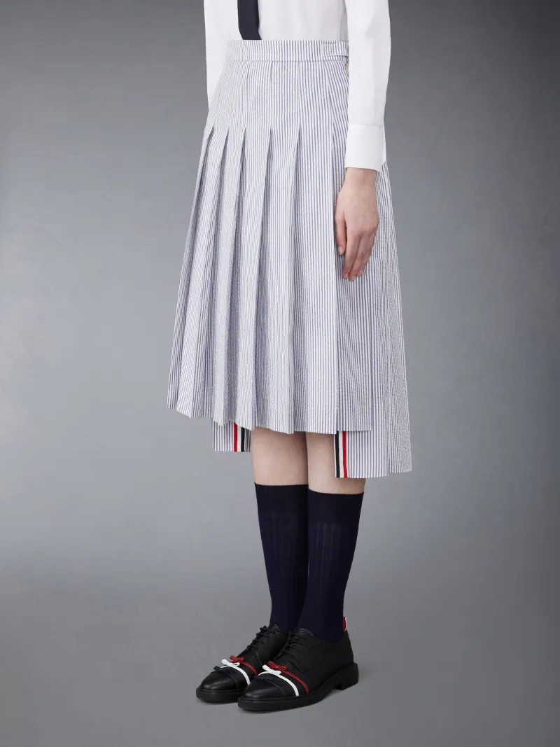 BELOW KNEE DROPPED BACK PLEATED SKIRT IN SEERSUCKER Thom Browne
