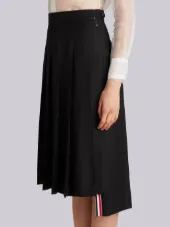 Dropped-Back Below Knee Pleated Skirt in Black Crepe Suiting