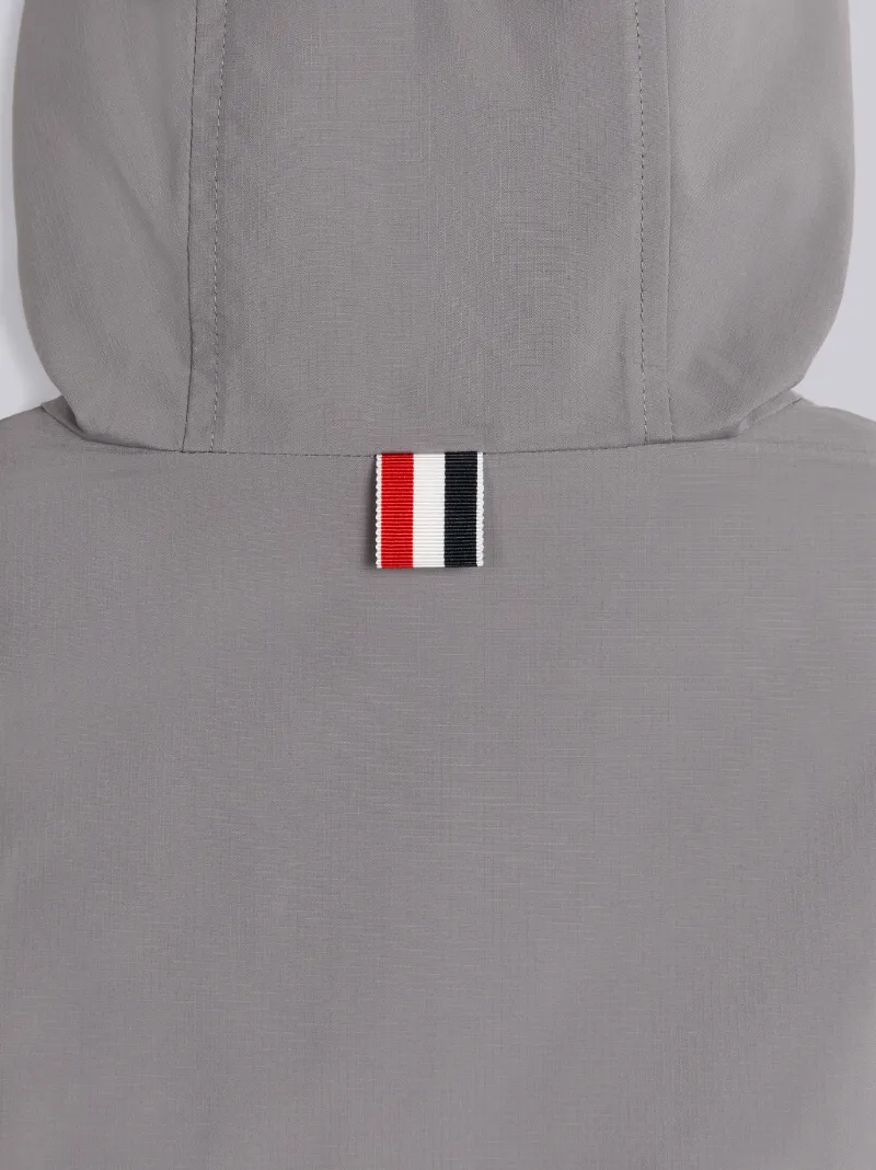 grey hooded rain mac