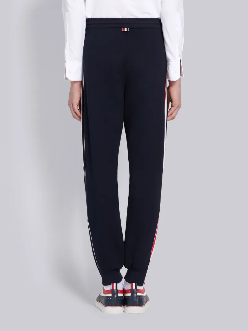 Navy Cotton Interlocking RWB Stripe Track Pants | Thom Browne